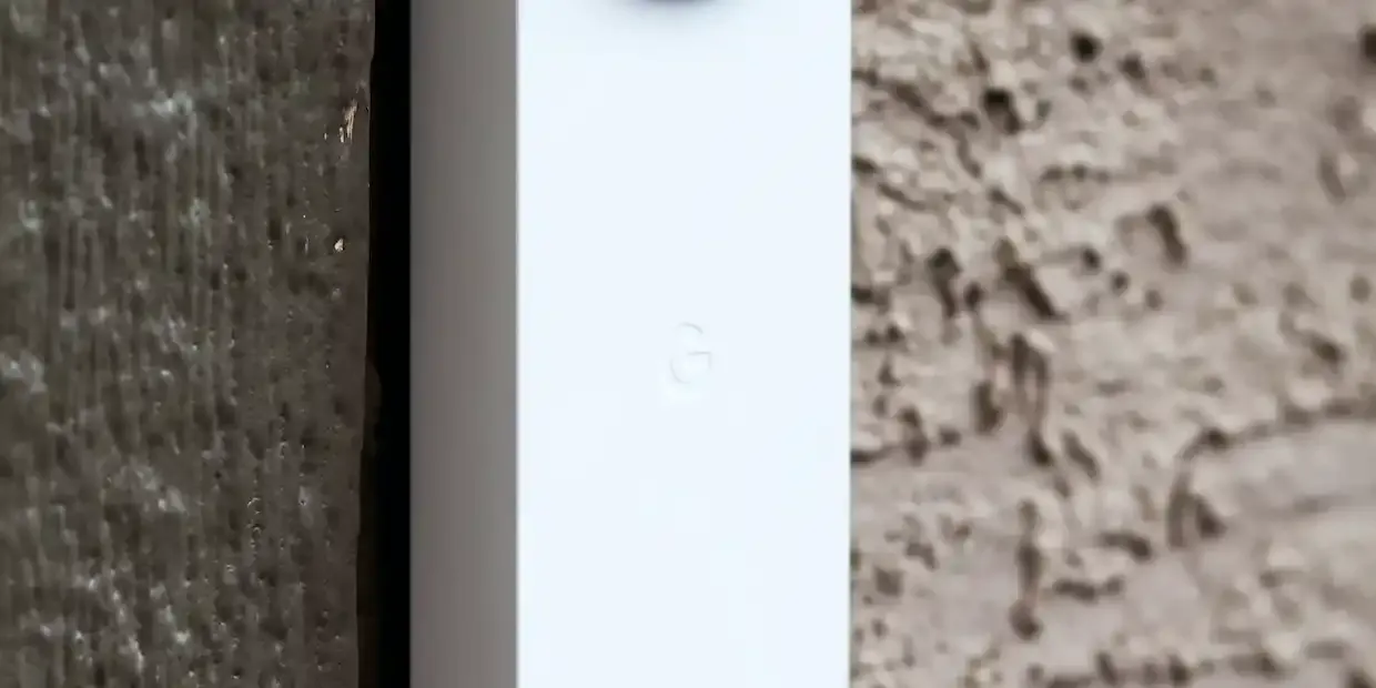 Smart video doorbell mounted beside a front door